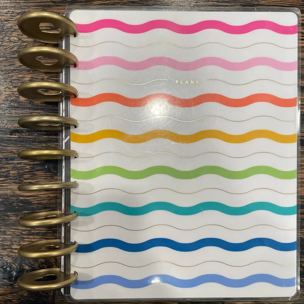 The Happy Planner Colorful Wave Calendar -mix of pages, rings, monthly dividers.